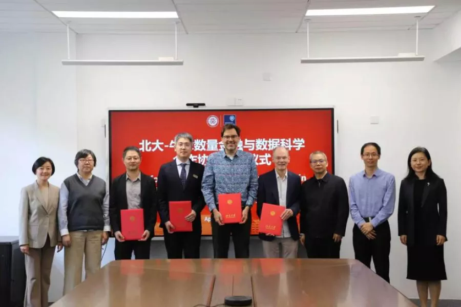 Researchers from both universities standing for a group photograph